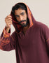 Patterned jacquard hooded sweater with long sleeves and pockets